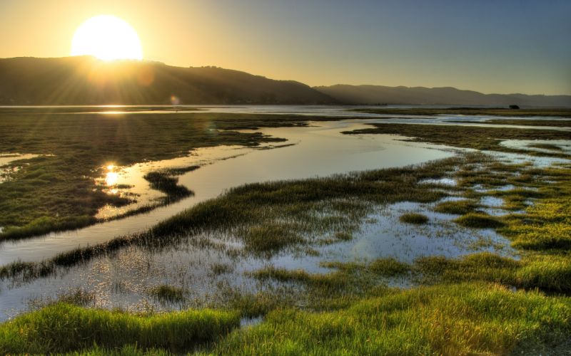 eco-cabins-river-sunset-min